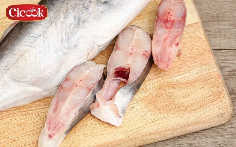 Spicy and sour pangasius conchophilus hotpot