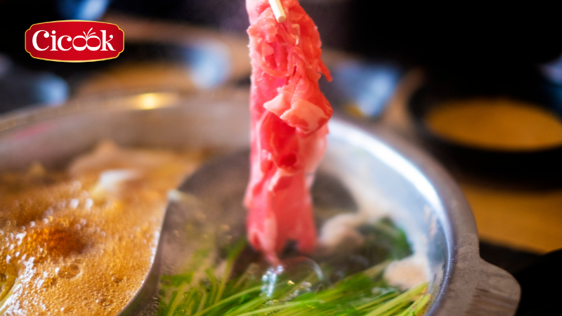 lẩu bò nhúng chua cay