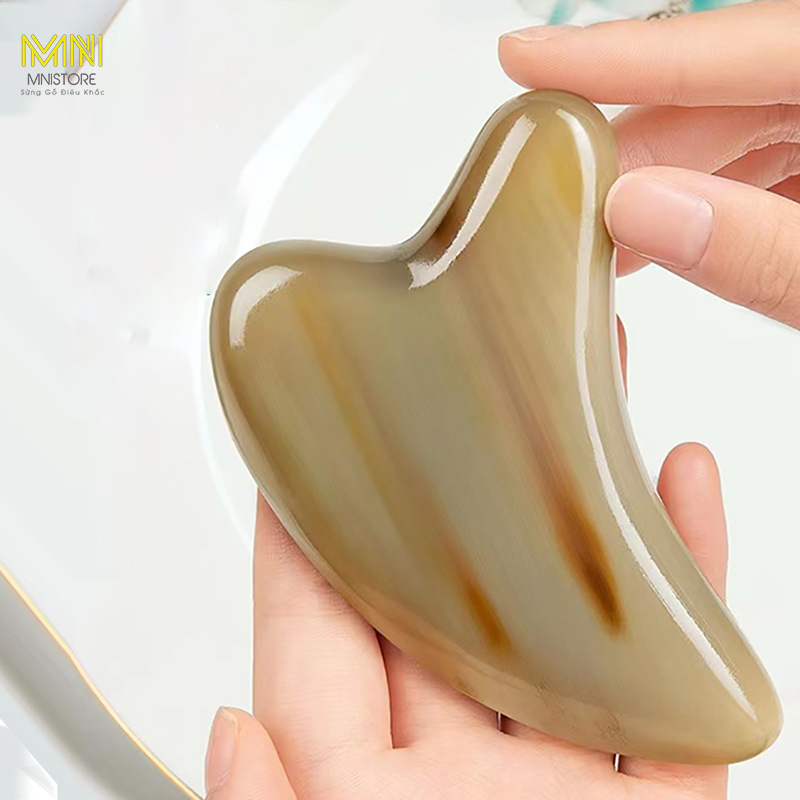 Dụng cụ massage mặt