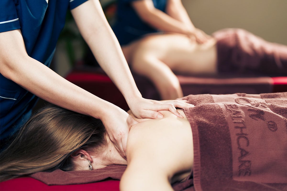 Vietnamese therapist performing acupressure massage in Ho Chi Minh