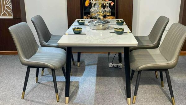 bàn ăn chân sắt bọc núm đồng - laviehome