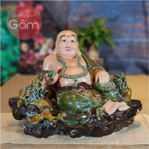 Có nên sử dụng tượng Phật Di Lặc cầm vàng thỏi?