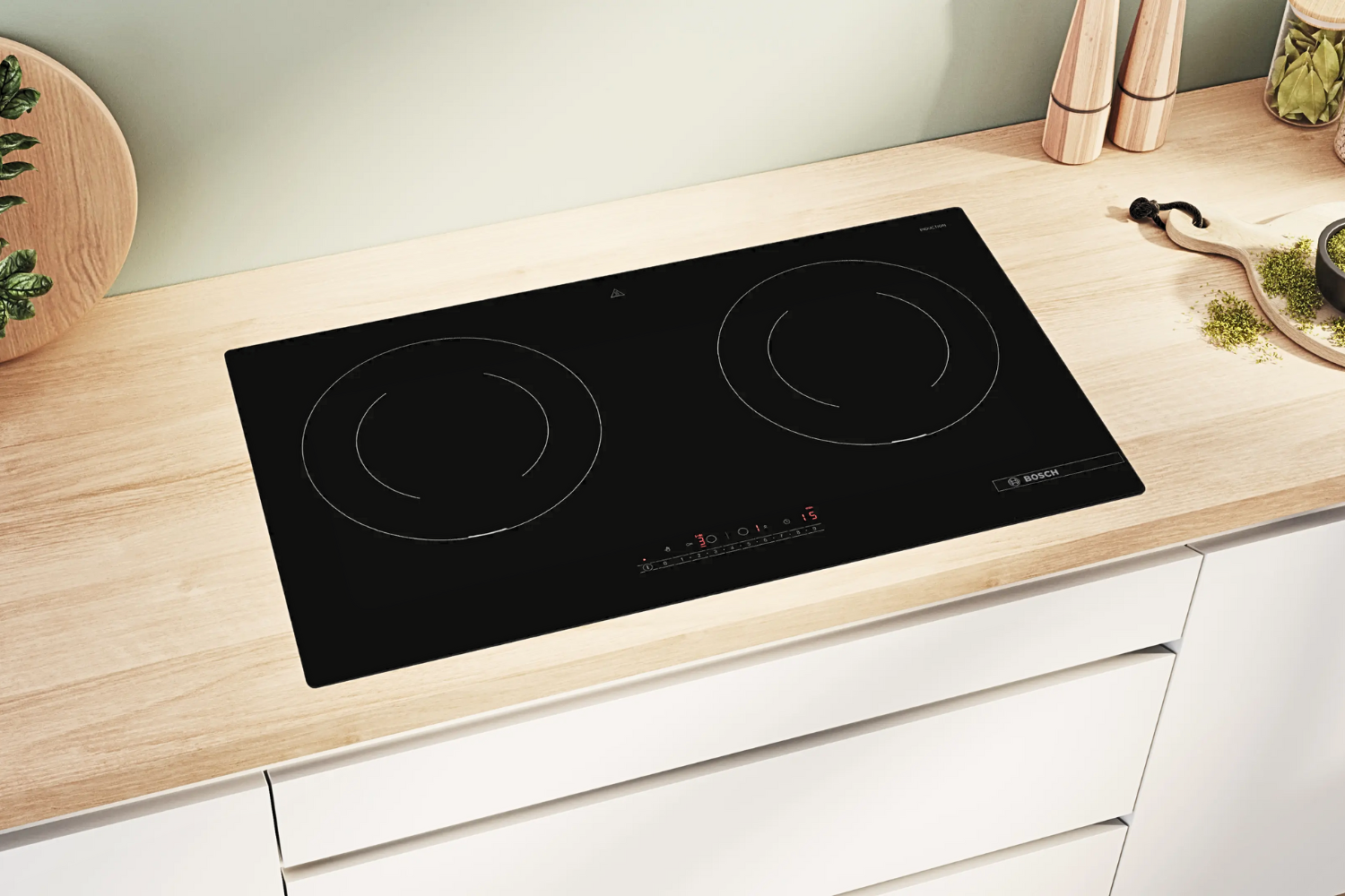 Bếp từ đôi Bosch PMI8256EVN được thiết kế lđể ắp âm hoàn toàn vào mặt đá