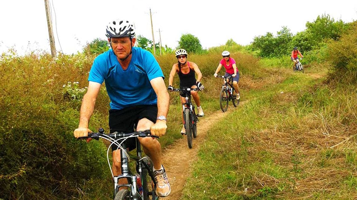 CYCLING THROUGH THE LAND OF NINE DRAGONS: AN IMMERSIVE DELTA ESCAPE