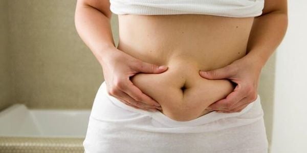 vùng bụng dưới tích mỡ do ăn uống không khoa học, thói quen xấu trong sinh hoạt, tuổi tác